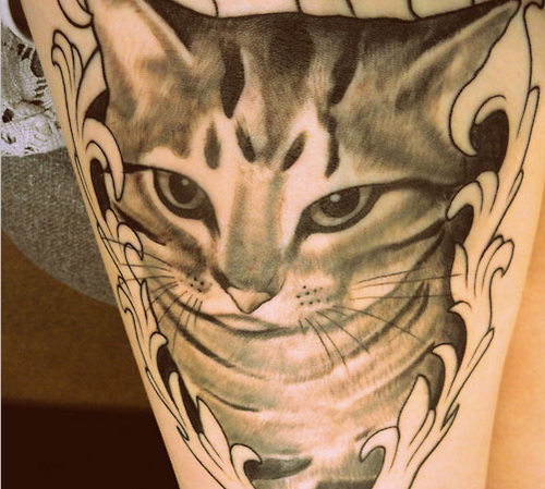 Cat Tattoo on Thigh