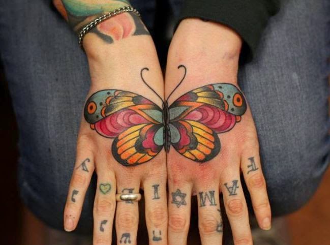 butterfly tattoo on hands