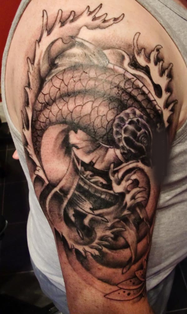 Fish on shoulder amazing tattoo