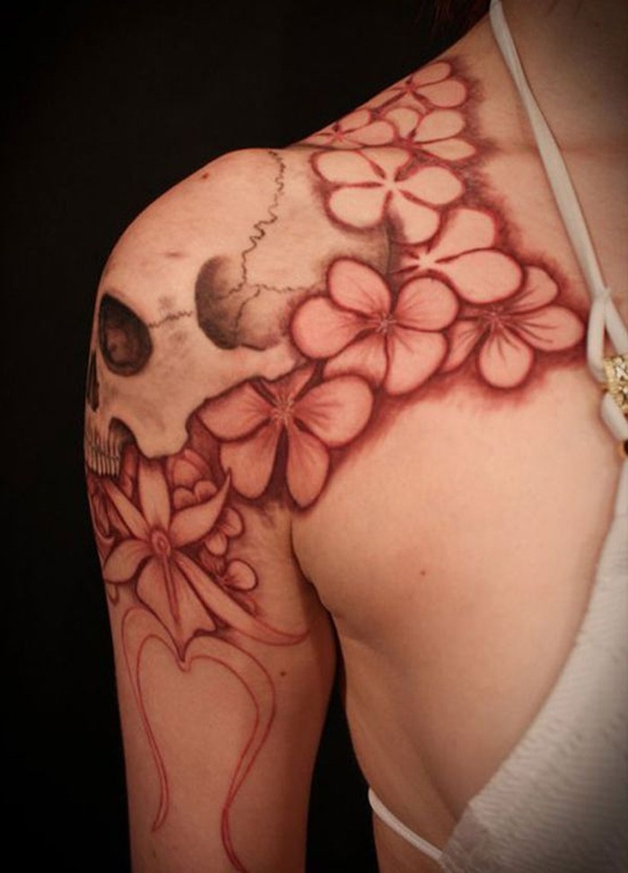 Flower and skull shoulder tattoos for women