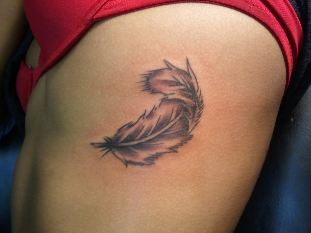 Permanent Feather Tattoo