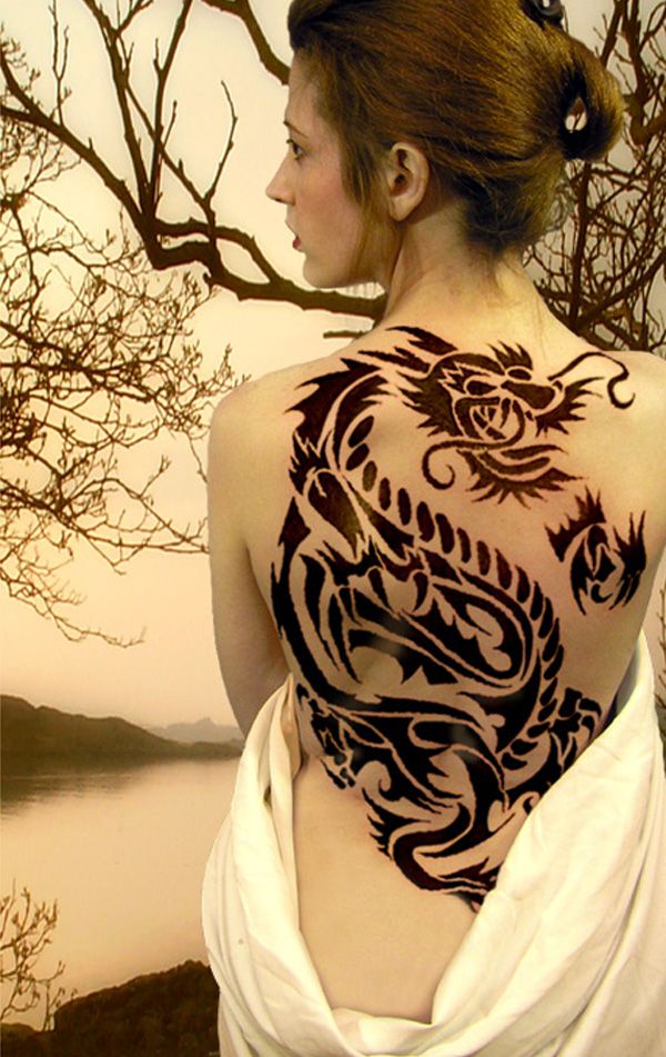 Permanent tribal dragon tattoo for women