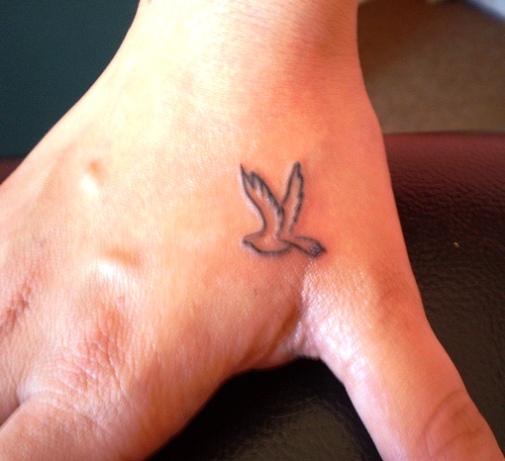 Tiny dove tattoo 2015