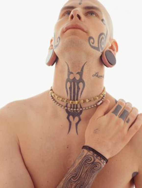 tribal-tattoos-on-neck-and-face